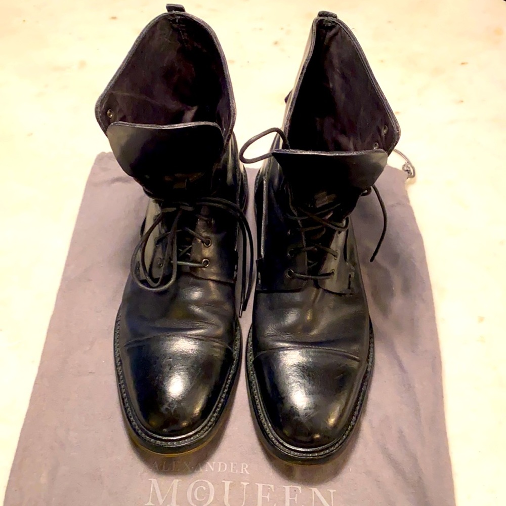 Men’s Alexander McQueen black leather boots.